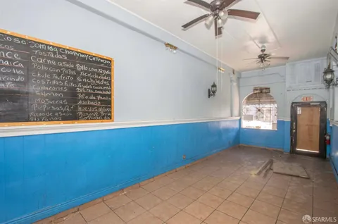 a view of an empty room and window
