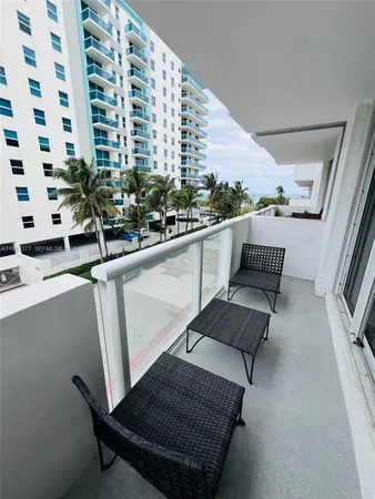 a view of balcony with outdoor seating