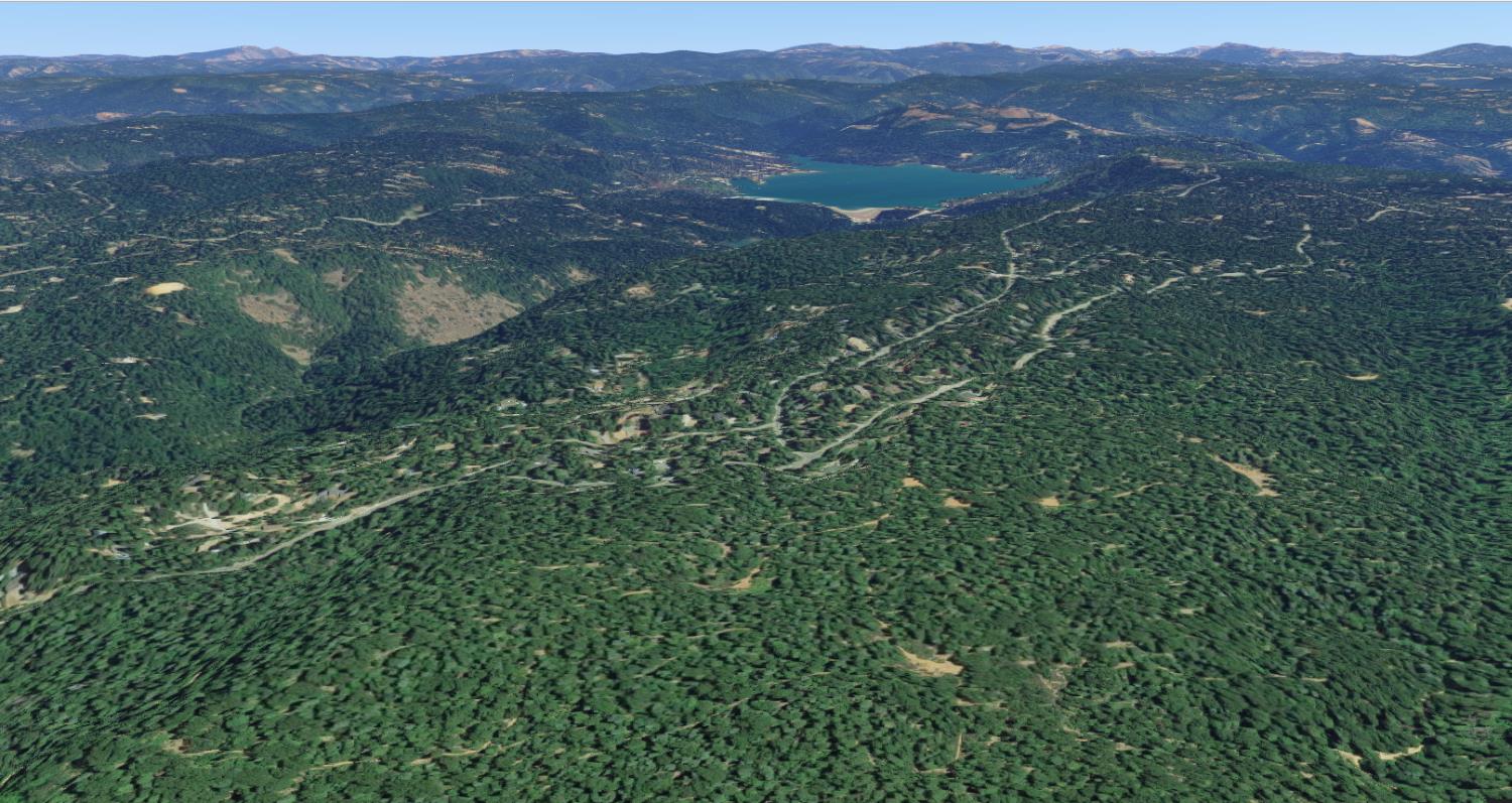 a view of an outdoor space with a mountain in the background