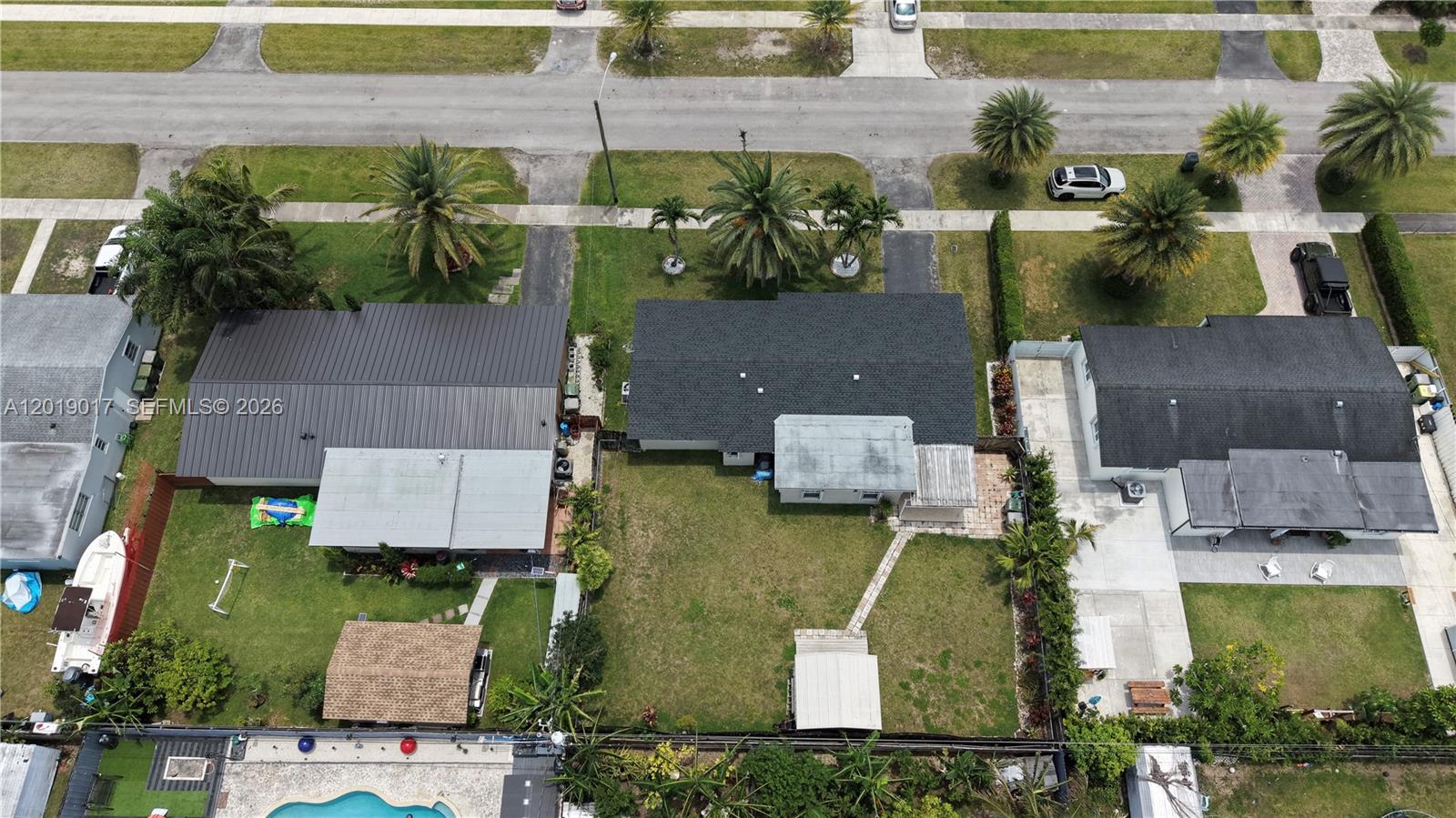 731 Northwest 17th Street Homestead, FL 33030 - Photo 24 of 29 an aerial view of residential houses with outdoor space