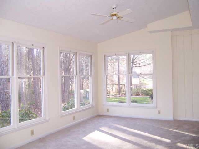 6605 Coach Light Circle Raleigh, NC 27613 - Photo 3 of 9 a view of livingroom with hardwood floor and window