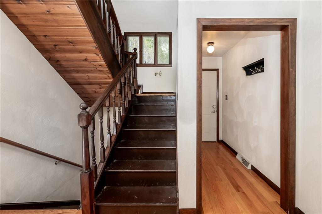 205 Briarwood Indiana, PA 15701 - Photo 12 of 23 a view of an entryway with wooden floor and stairs