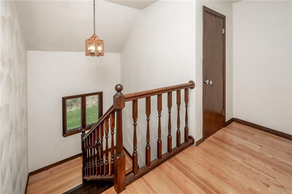 205 Briarwood Indiana, PA 15701 - Photo 13 of 23 a view of a hallway with wooden floor and staircase