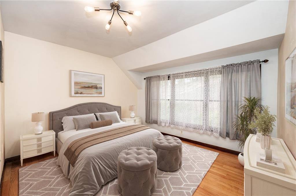 205 Briarwood Indiana, PA 15701 - Photo 14 of 23 a spacious bedroom with a bed and a large window