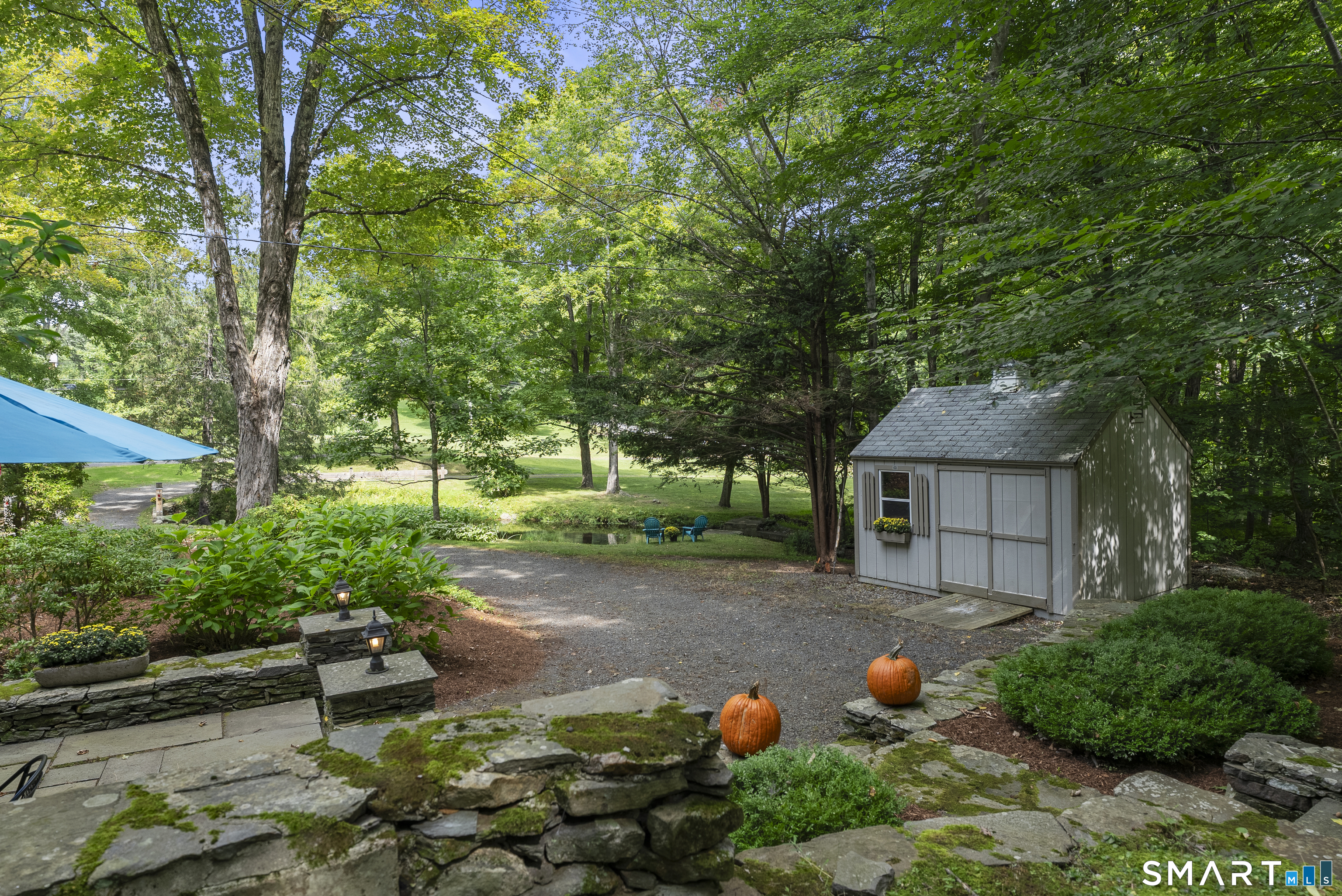 43 Goose Hill Road Chester, CT 06412 - Photo 4 of 39 Patio with stone walls