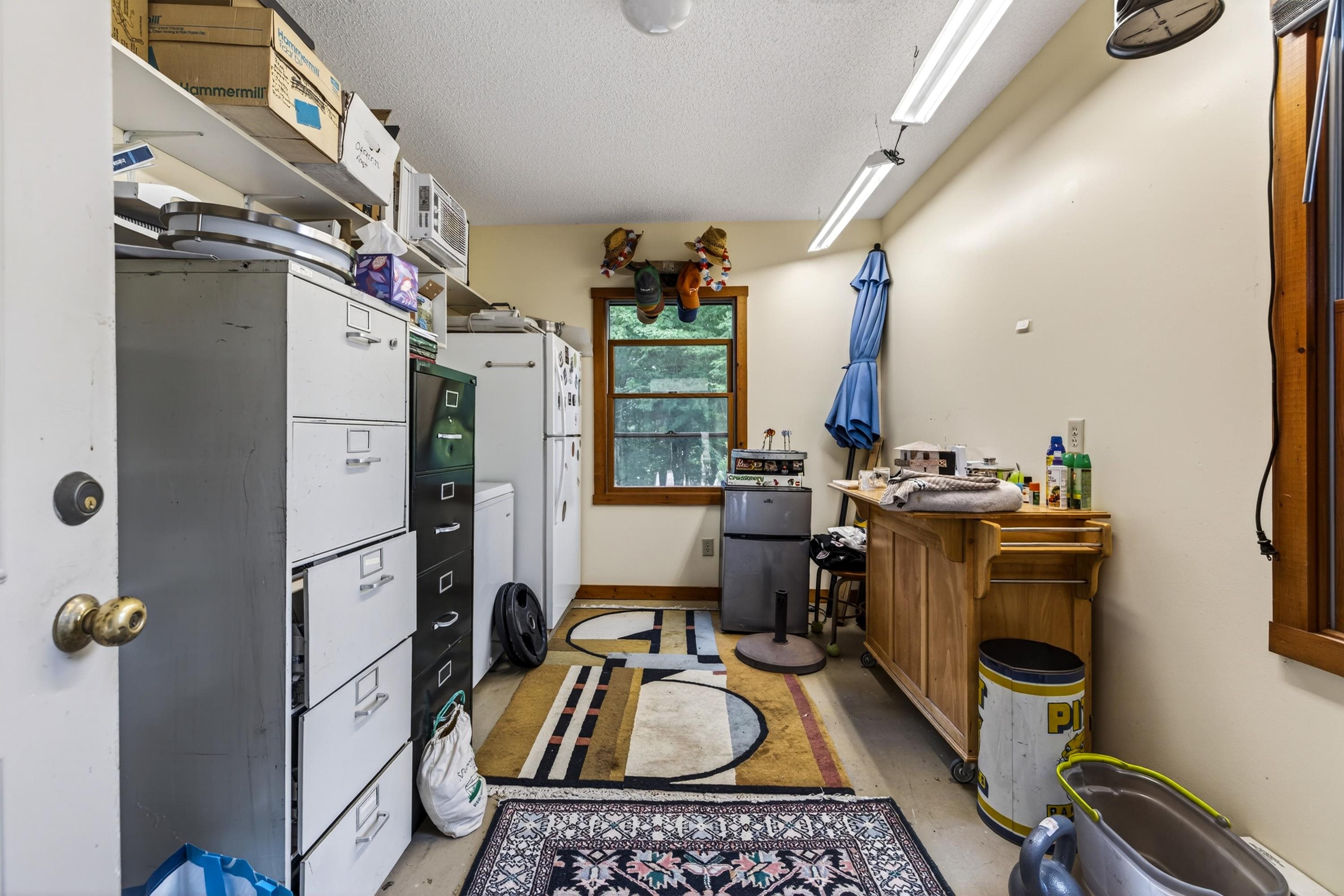 3980 Greenmount Road Harrisonburg, VA 22802 - Photo 45 of 75 The laundry room features a large area with full size washer & dryer hookups. This space also features areas for file cabinets and more!