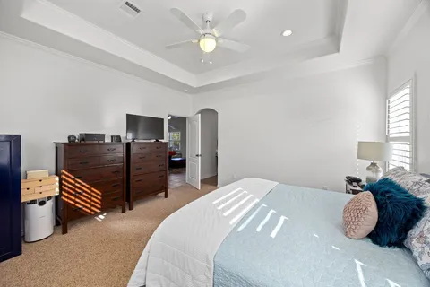 a bedroom with a bed and furniture