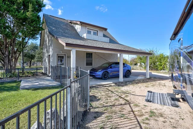 a view of a house with a patio