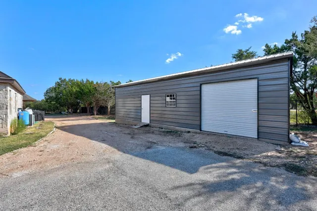 a view of backyard of house