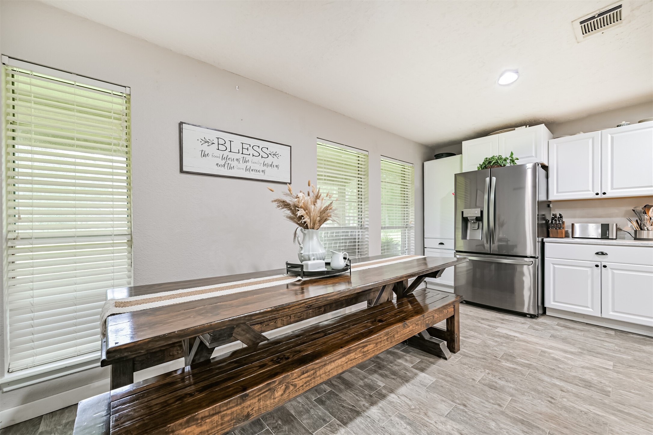 26925 Brentwood Road Splendora, TX 77372 - Photo 21 of 30 a kitchen with a sink appliances and cabinets