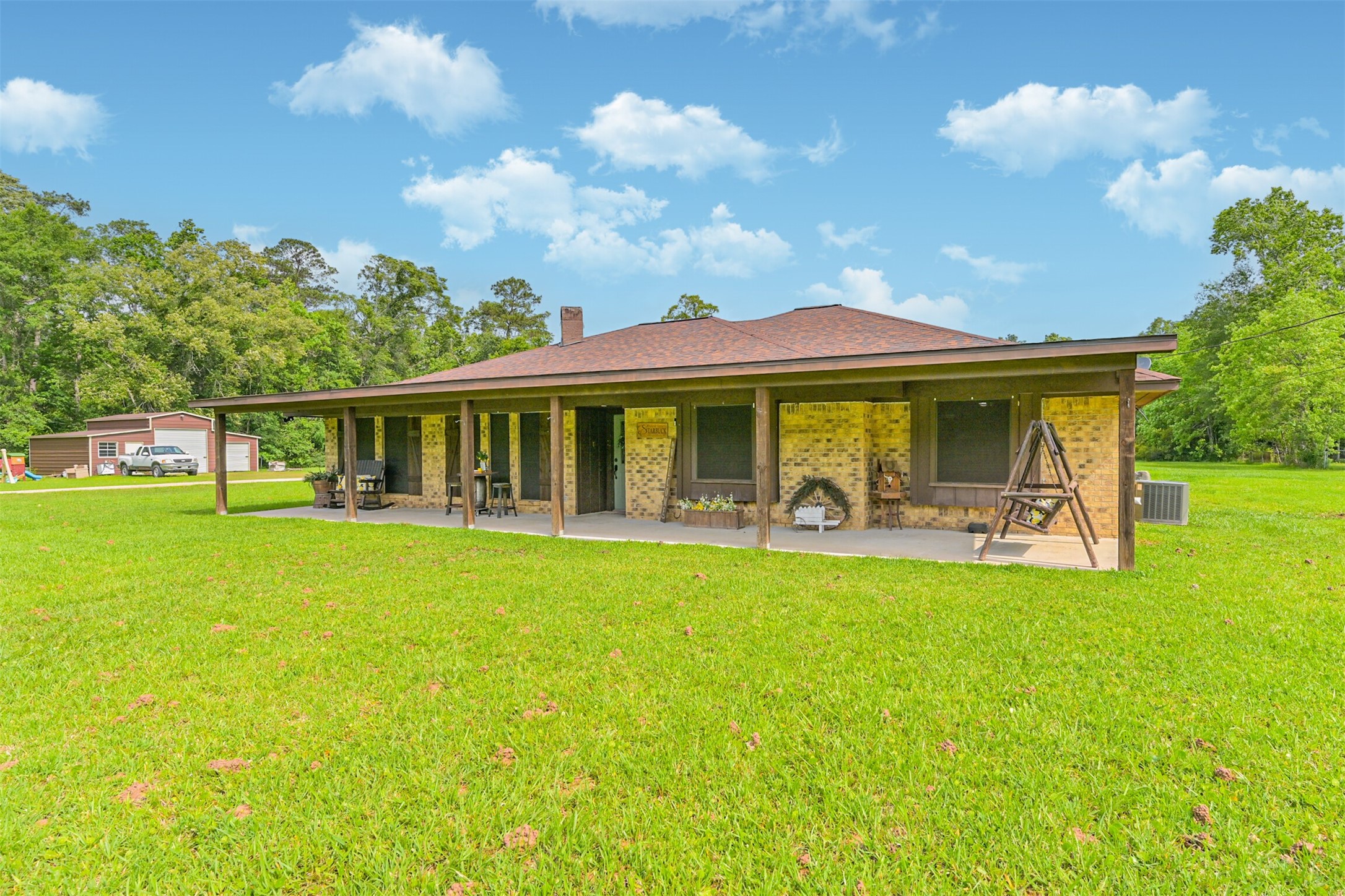 26925 Brentwood Road Splendora, TX 77372 - Photo 6 of 30 a view of a house with a swimming pool