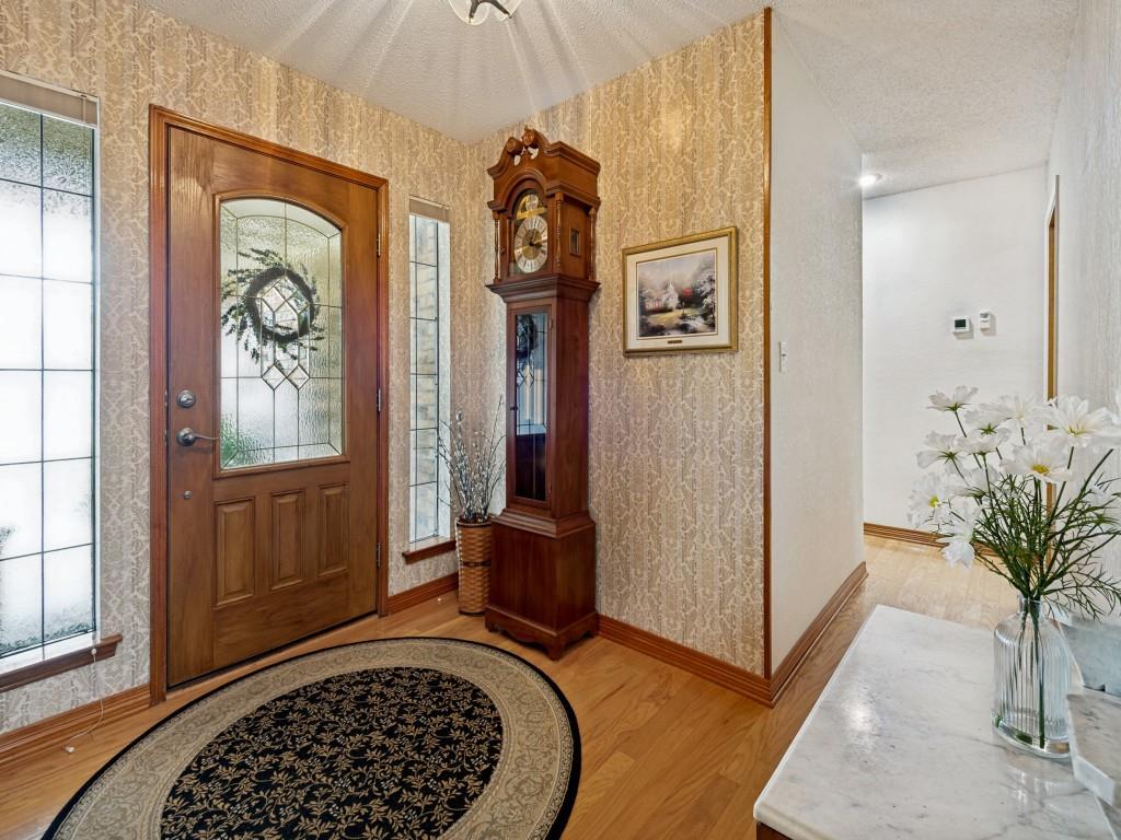 2213 Ridgewood Bedford, TX 76021 - Photo 4 of 40 Entry foyer is inviting and includes a coat closet.