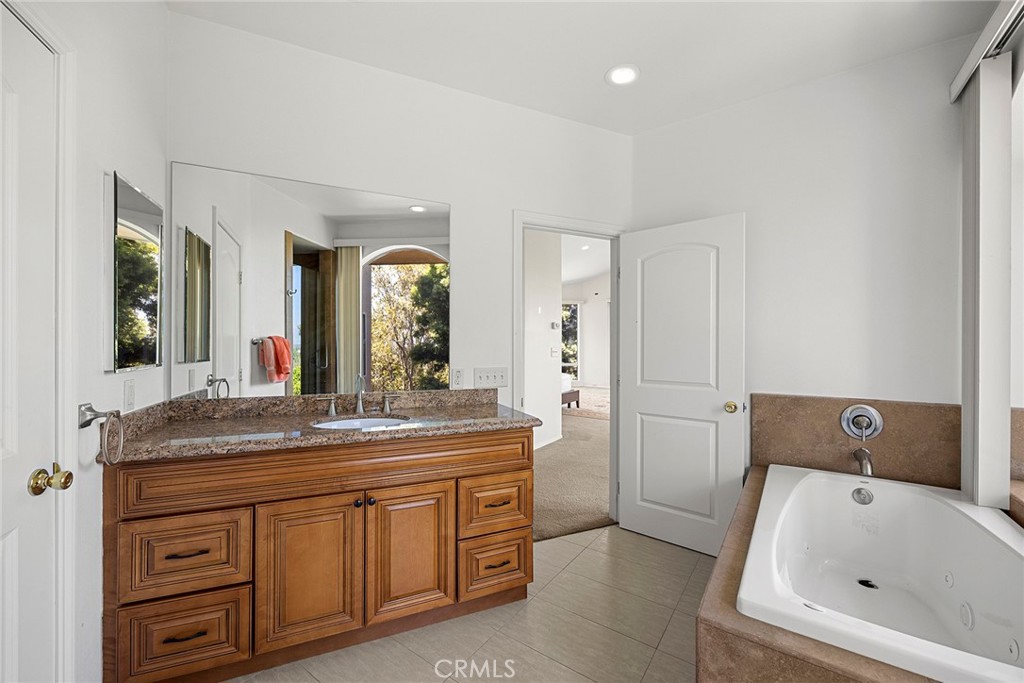 1730 Rocky Road Fullerton, CA 92831 - Photo 61 of 75 En-Suite 7 Bathroom with sunken tub and walk-in shower.