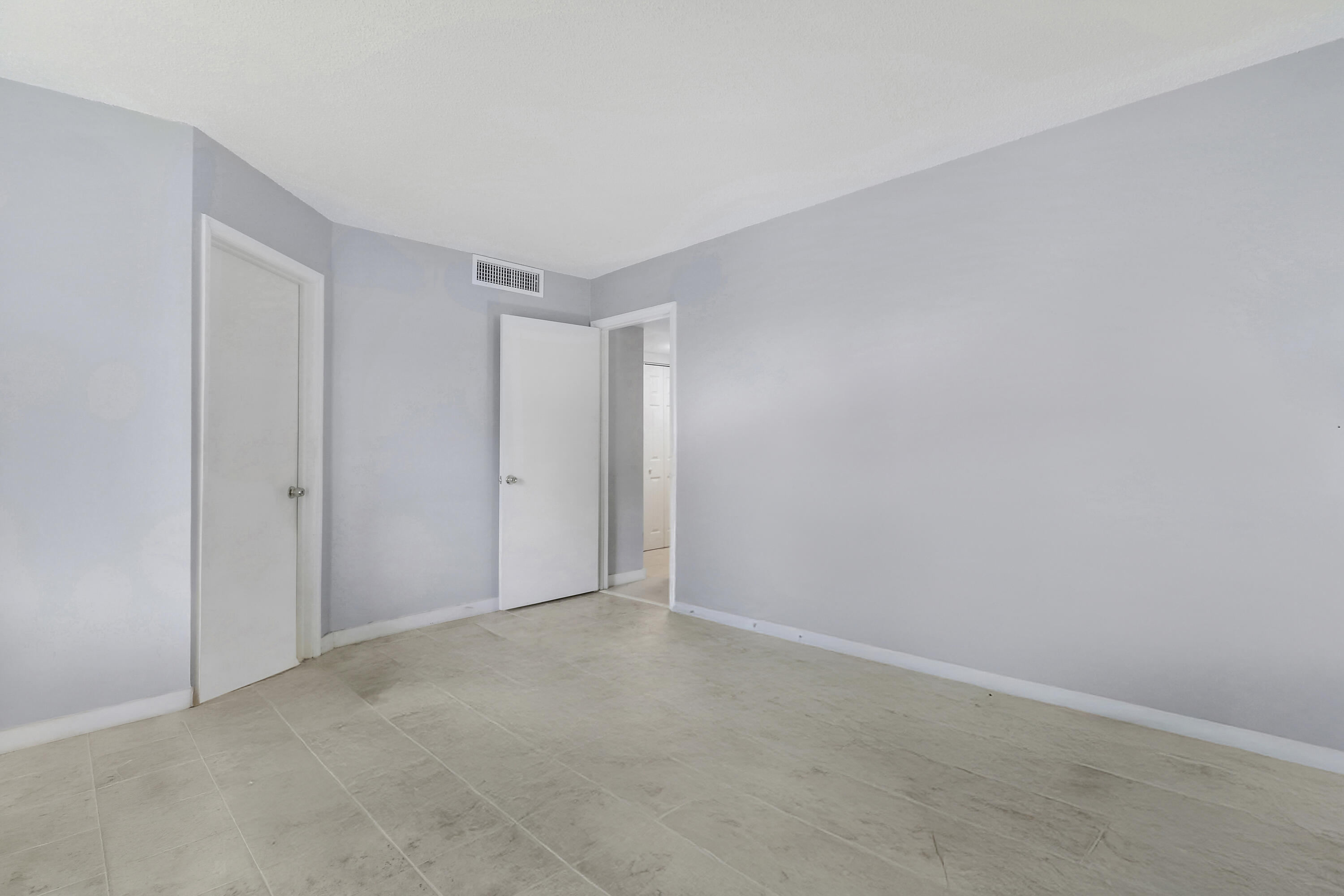 150 Pineview Road, Unit C4 Jupiter, FL 33469 - Photo 15 of 17 Primary Bedroom