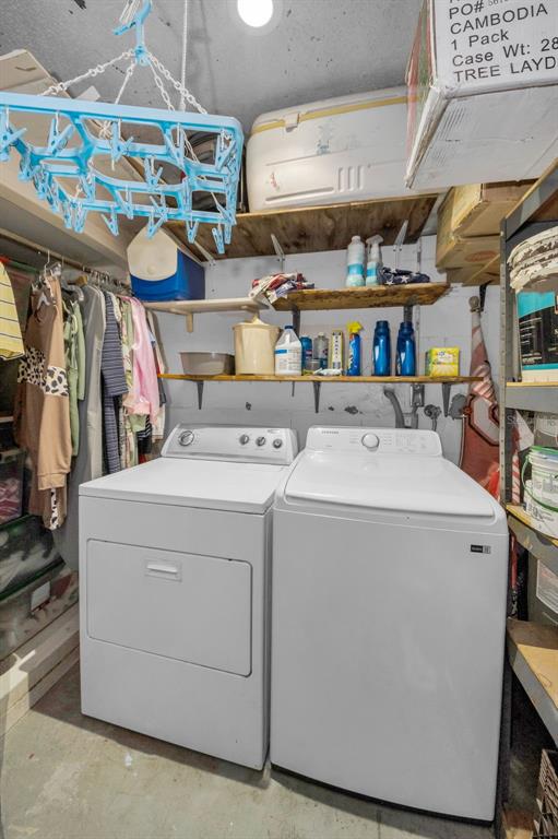 8037 Powder Horn Circle Largo, FL 33773 - Photo 17 of 27 a utility room with dryer and washer