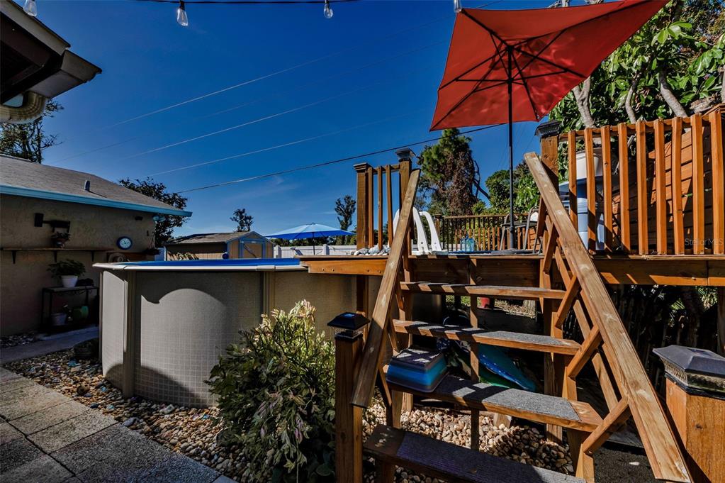 8037 Powder Horn Circle Largo, FL 33773 - Photo 22 of 27 a view of an outdoor sitting area