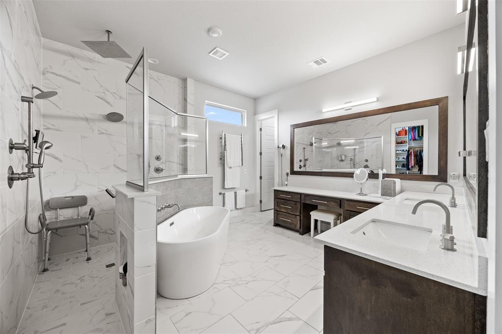 1730 Lone Elm Road Waxahachie, TX 75167 - Photo 23 of 40 a bathroom with a sink a toilet and shower