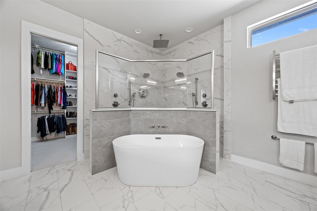 1730 Lone Elm Road Waxahachie, TX 75167 - Photo 25 of 40 a spacious bathroom with a bathtub and a shower