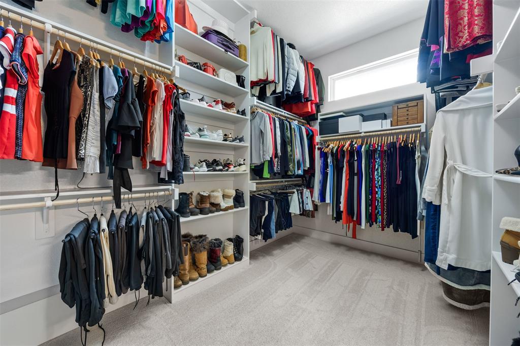 1730 Lone Elm Road Waxahachie, TX 75167 - Photo 26 of 40 a view of walk in closet with clothes