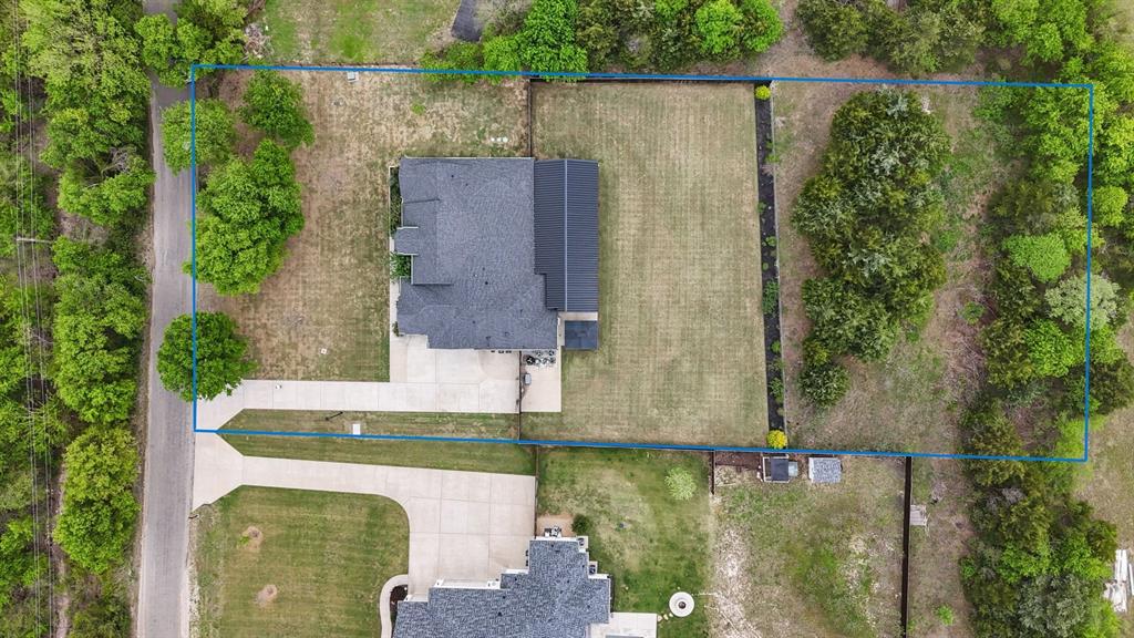1730 Lone Elm Road Waxahachie, TX 75167 - Photo 38 of 40 an aerial view of a house with a yard basket ball court and outdoor seating