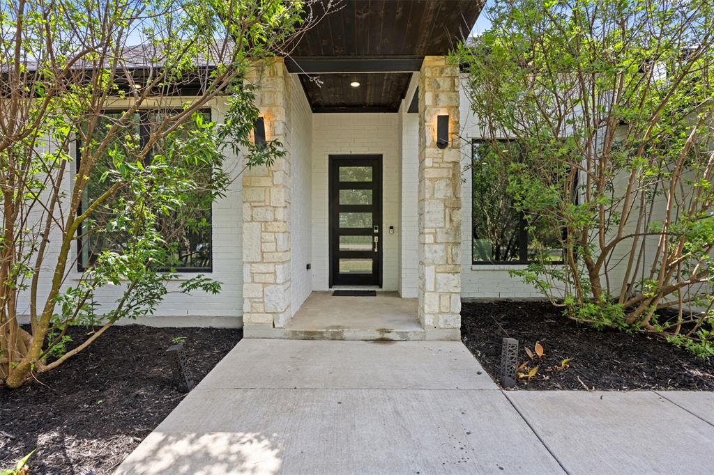 1730 Lone Elm Road Waxahachie, TX 75167 - Photo 7 of 40 a front view of a house with a yard