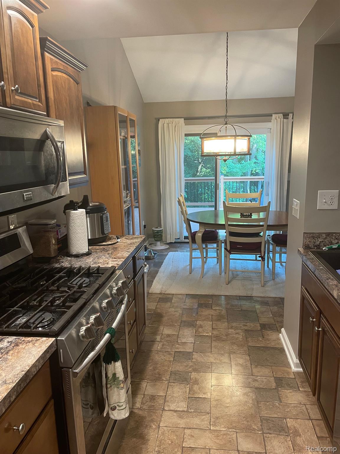5263 Diehl Road Metamora, MI 48455 - Photo 6 of 45 Kitchen & dining area w/ door to balcony
