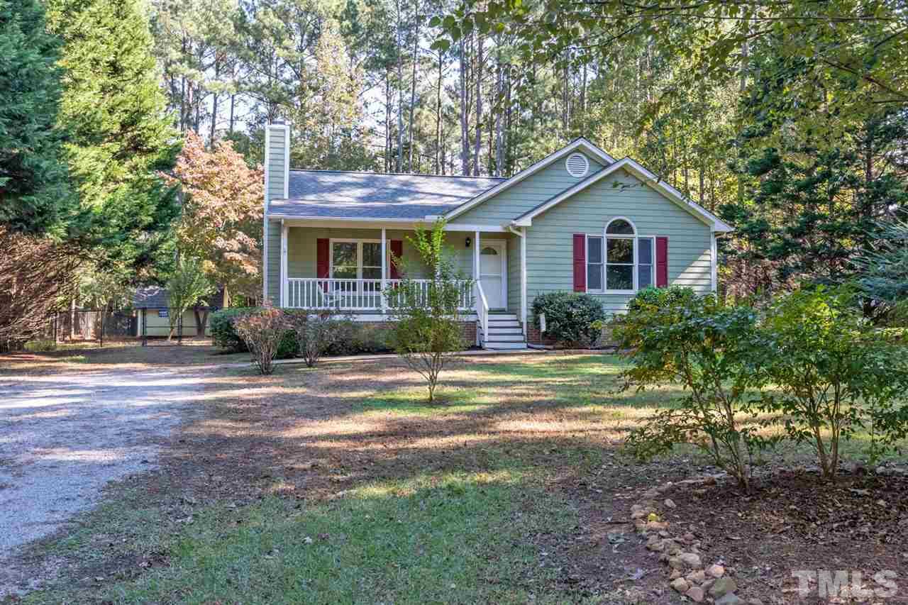 5209 Relay Way Raleigh, NC 27603 - Photo 3 of 25 a view of a house with yard and plants