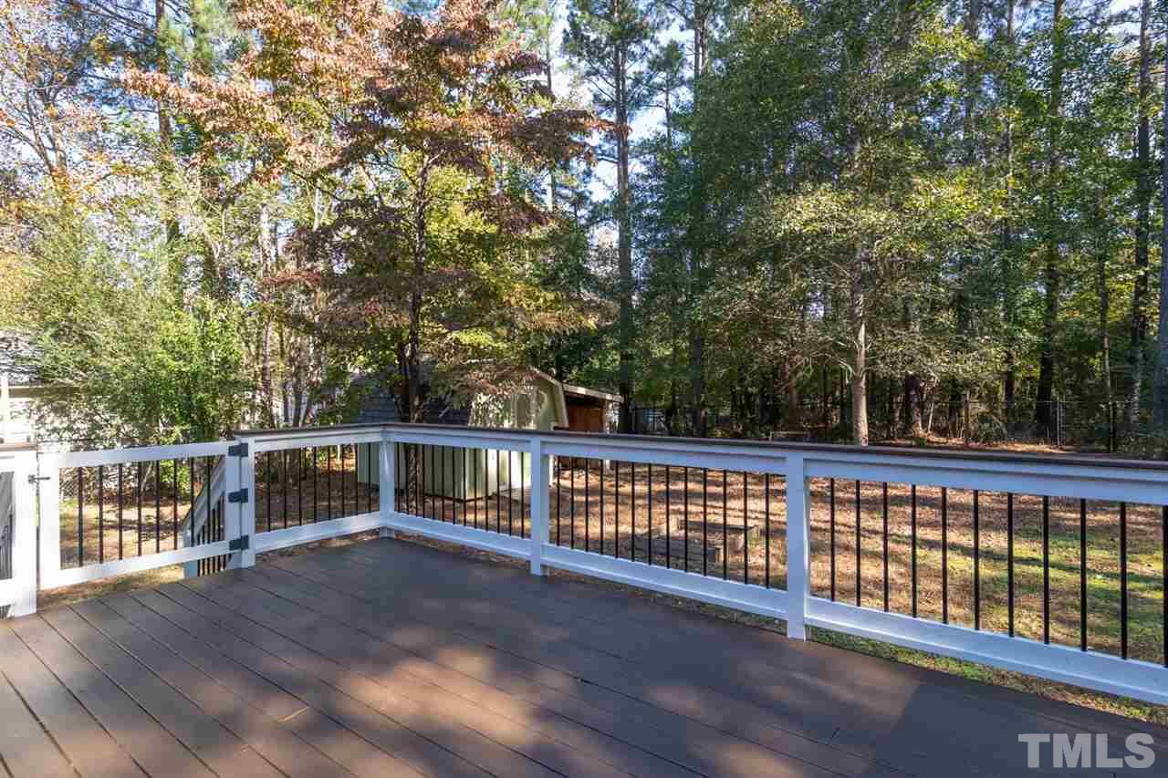 5209 Relay Way Raleigh, NC 27603 - Photo 22 of 25 a view of deck with a large trees