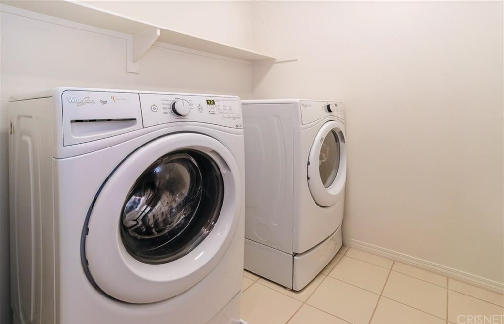 22166 Barrington Way Saugus, CA 91350 - Photo 14 of 19 a utility room with dryer and washer
