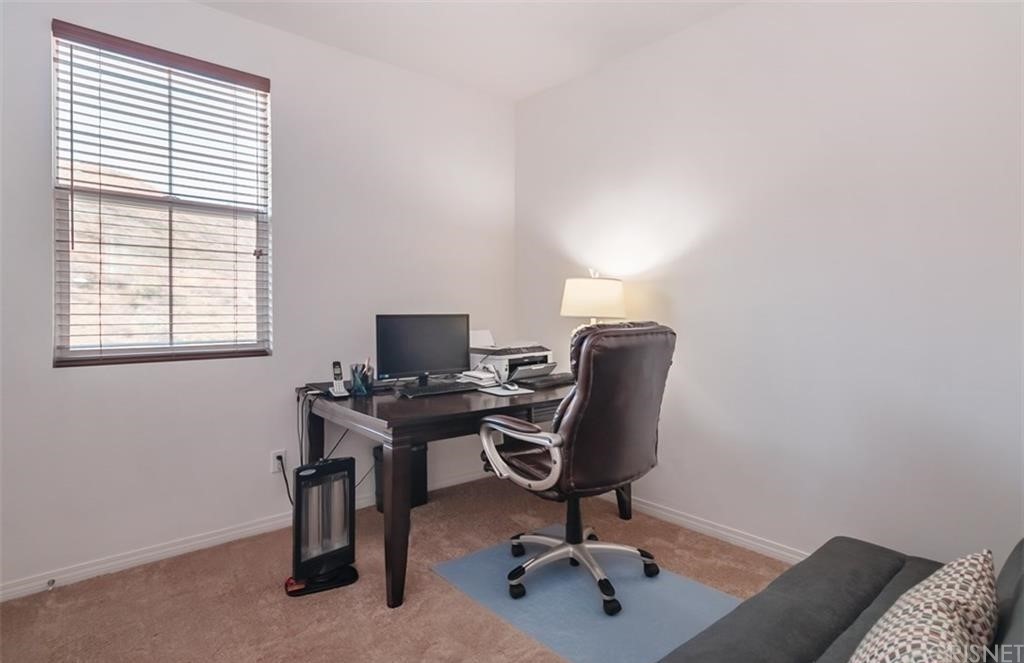 22166 Barrington Way Saugus, CA 91350 - Photo 8 of 19 a view of a workspace with a window