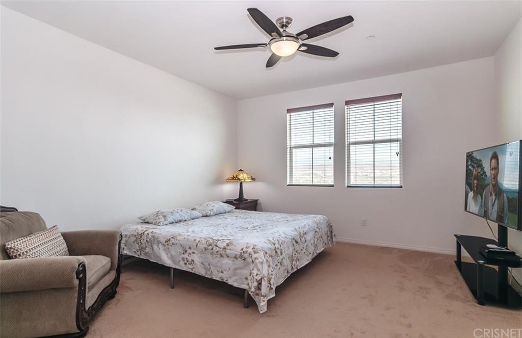 22166 Barrington Way Saugus, CA 91350 - Photo 9 of 19 a bedroom with a bed furniture and a window