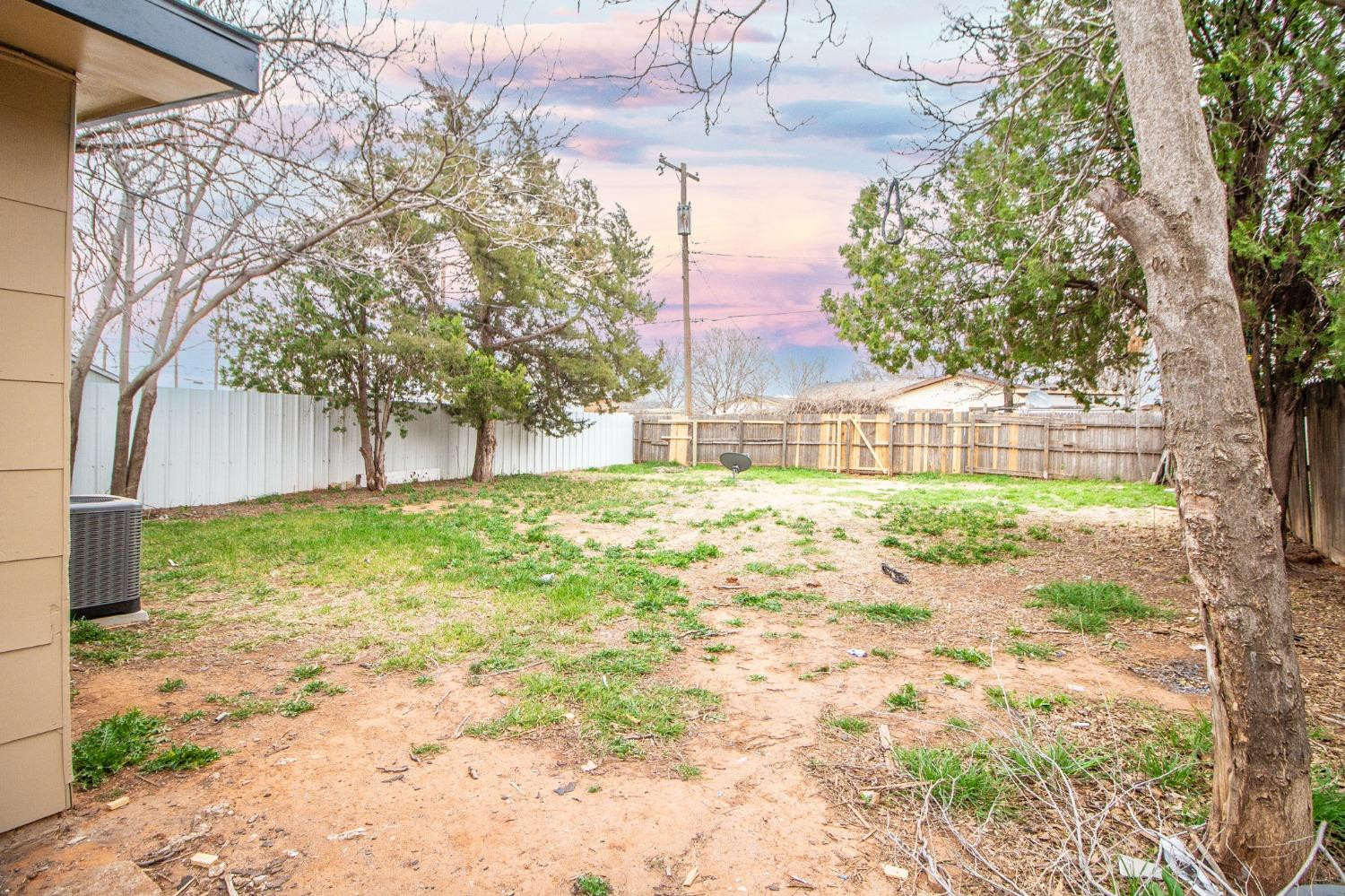 5105 39th Street Lubbock, TX 79414 - Photo 17 of 18 a view of back yard of the house