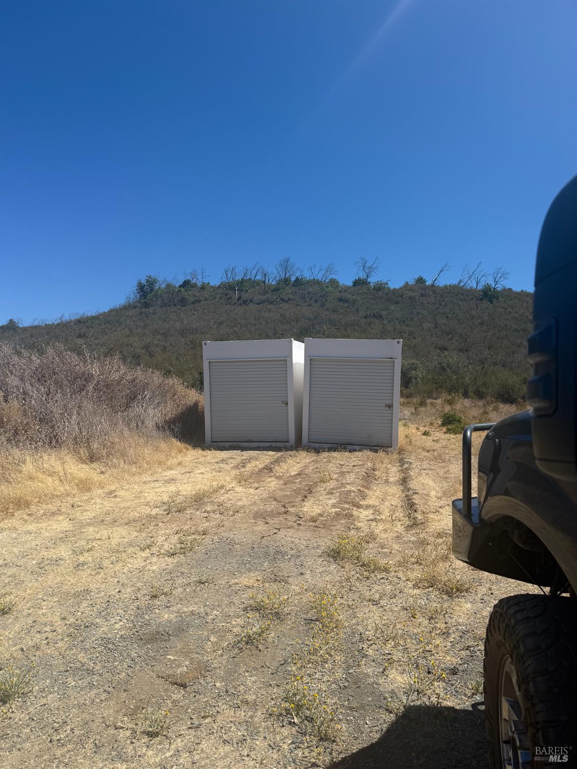 13200 Seigler Canyon Road Lower Lake, CA 95457 - Photo 16 of 30 a backyard of a house with a yard