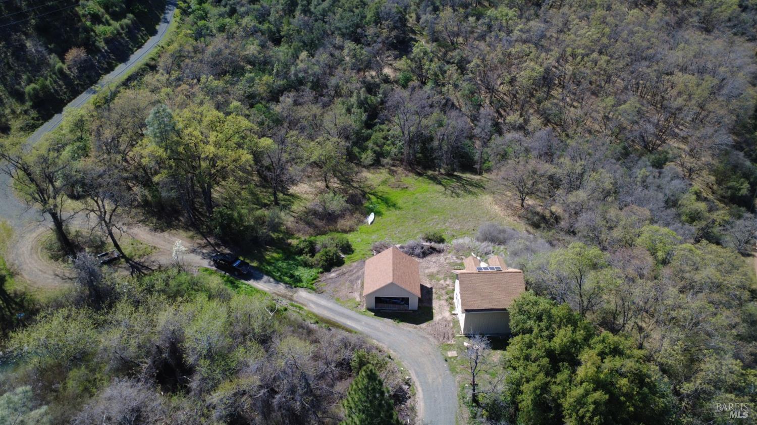 13200 Seigler Canyon Road Lower Lake, CA 95457 - Photo 27 of 30 an aerial view of a house with a yard