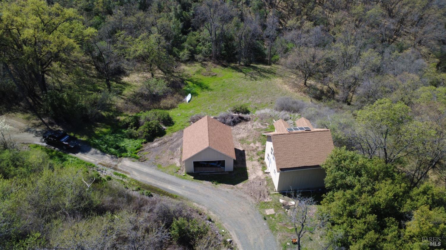 13200 Seigler Canyon Road Lower Lake, CA 95457 - Photo 28 of 30 an aerial view of a house with a yard