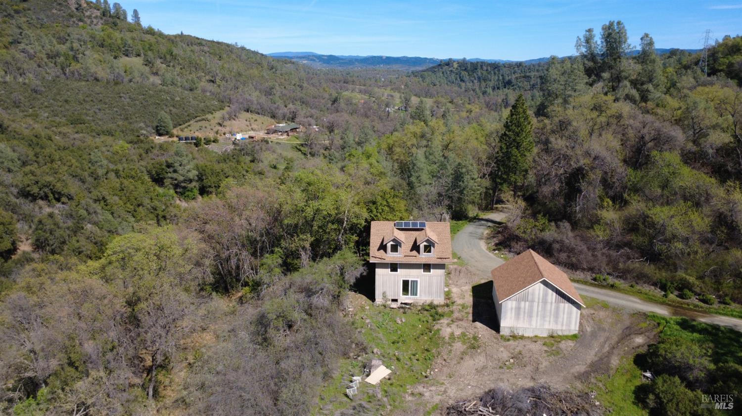 13200 Seigler Canyon Road Lower Lake, CA 95457 - Photo 29 of 30 an aerial view of a house with a yard