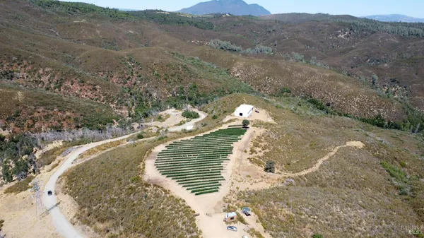 a view of a wooden floor and a mountain view
