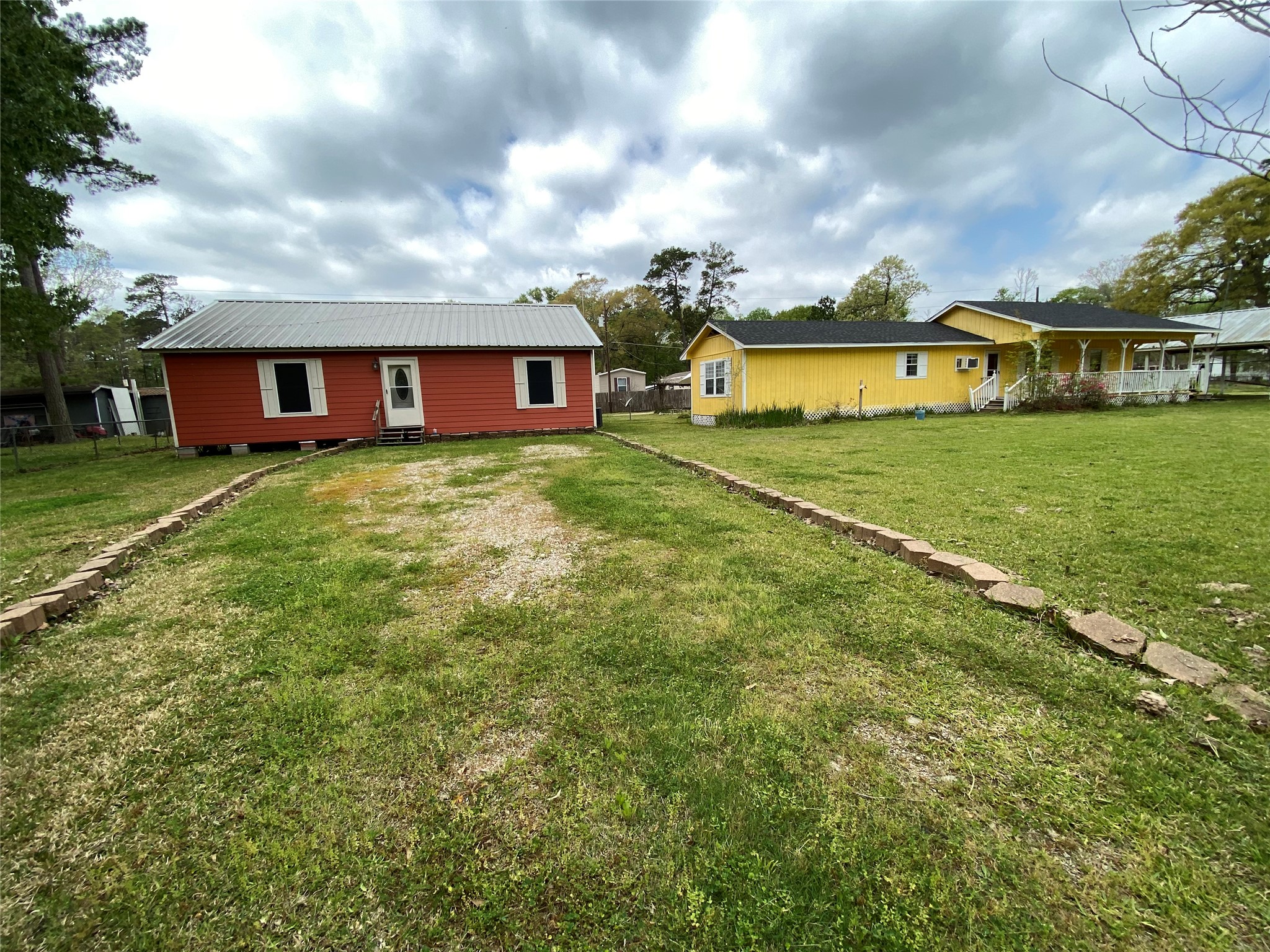 a view of a house with a big yard