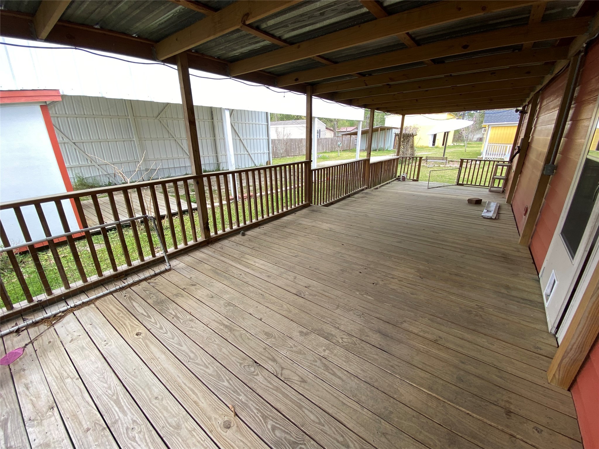 20672 Trinity Way New Caney, TX 77357 - Photo 14 of 41 a view of balcony with wooden floor