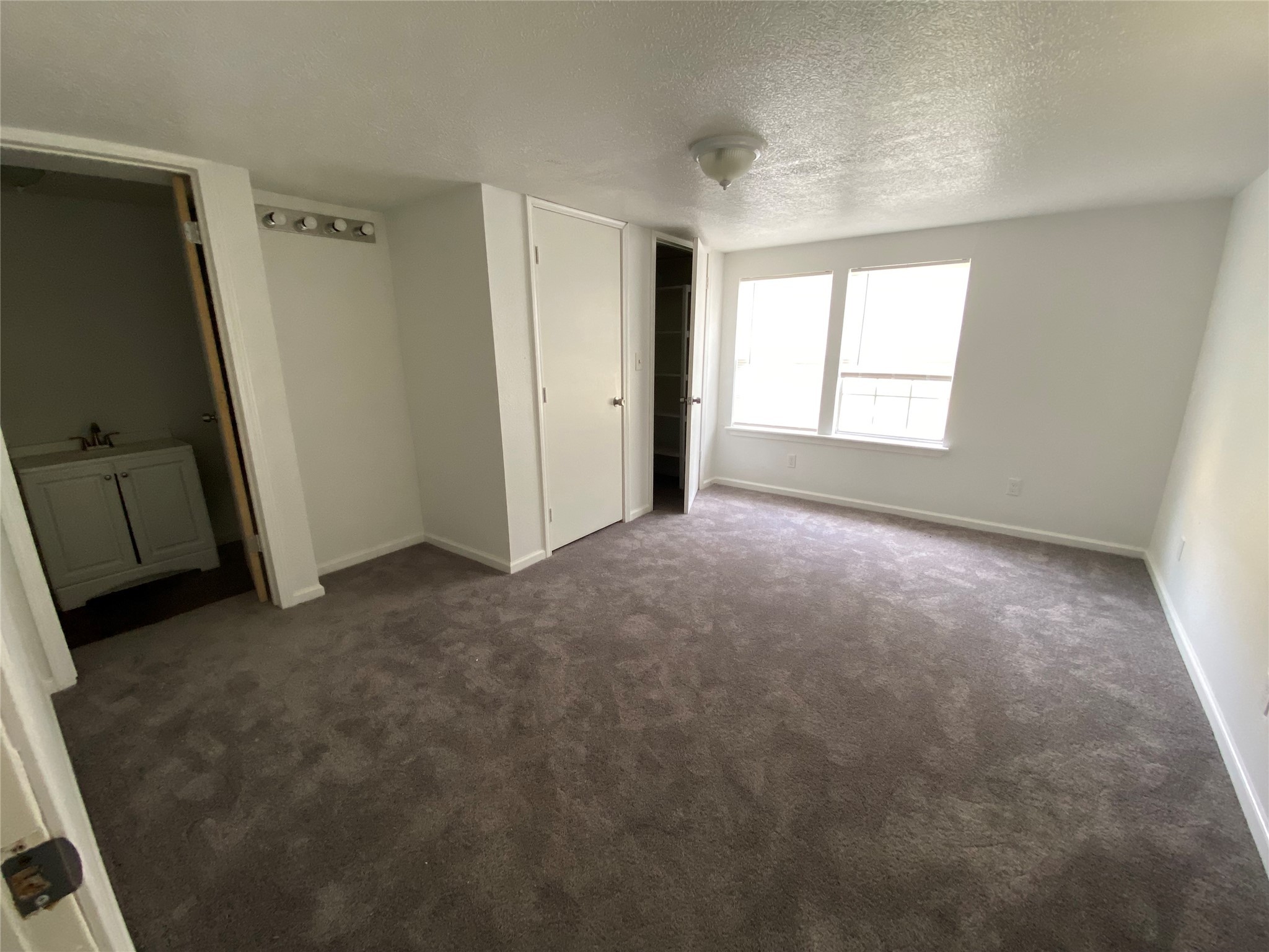 20672 Trinity Way New Caney, TX 77357 - Photo 22 of 41 an empty room with windows