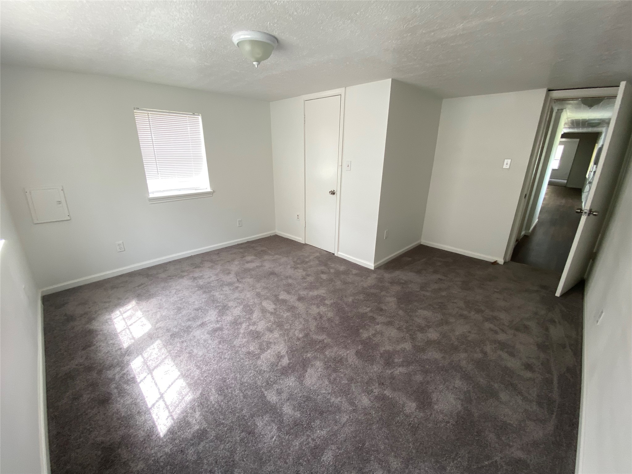20672 Trinity Way New Caney, TX 77357 - Photo 29 of 41 an empty room with windows