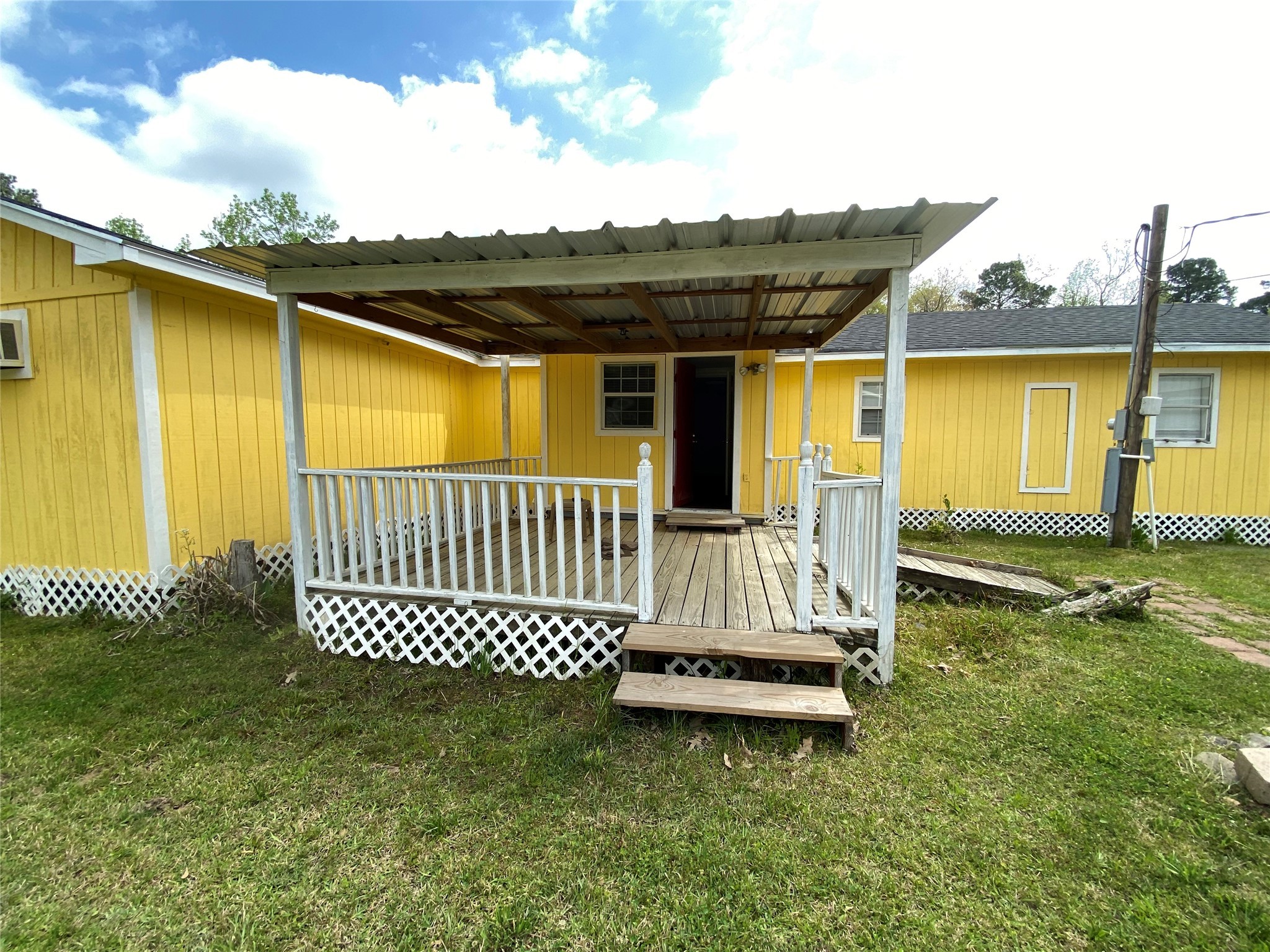 20672 Trinity Way New Caney, TX 77357 - Photo 32 of 41 a view of a chair and table in the patio