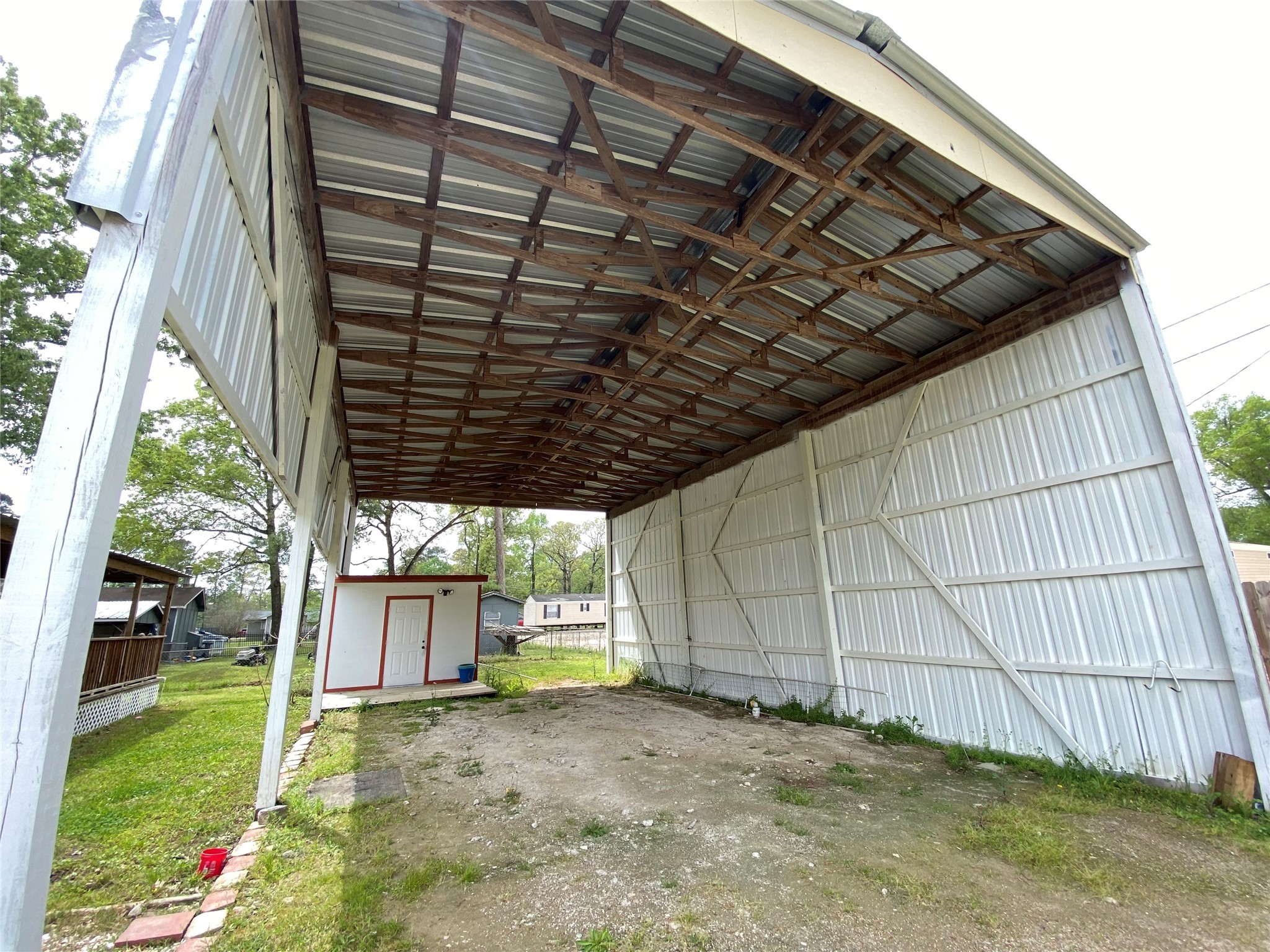 20672 Trinity Way New Caney, TX 77357 - Photo 33 of 41 a view of a backyard