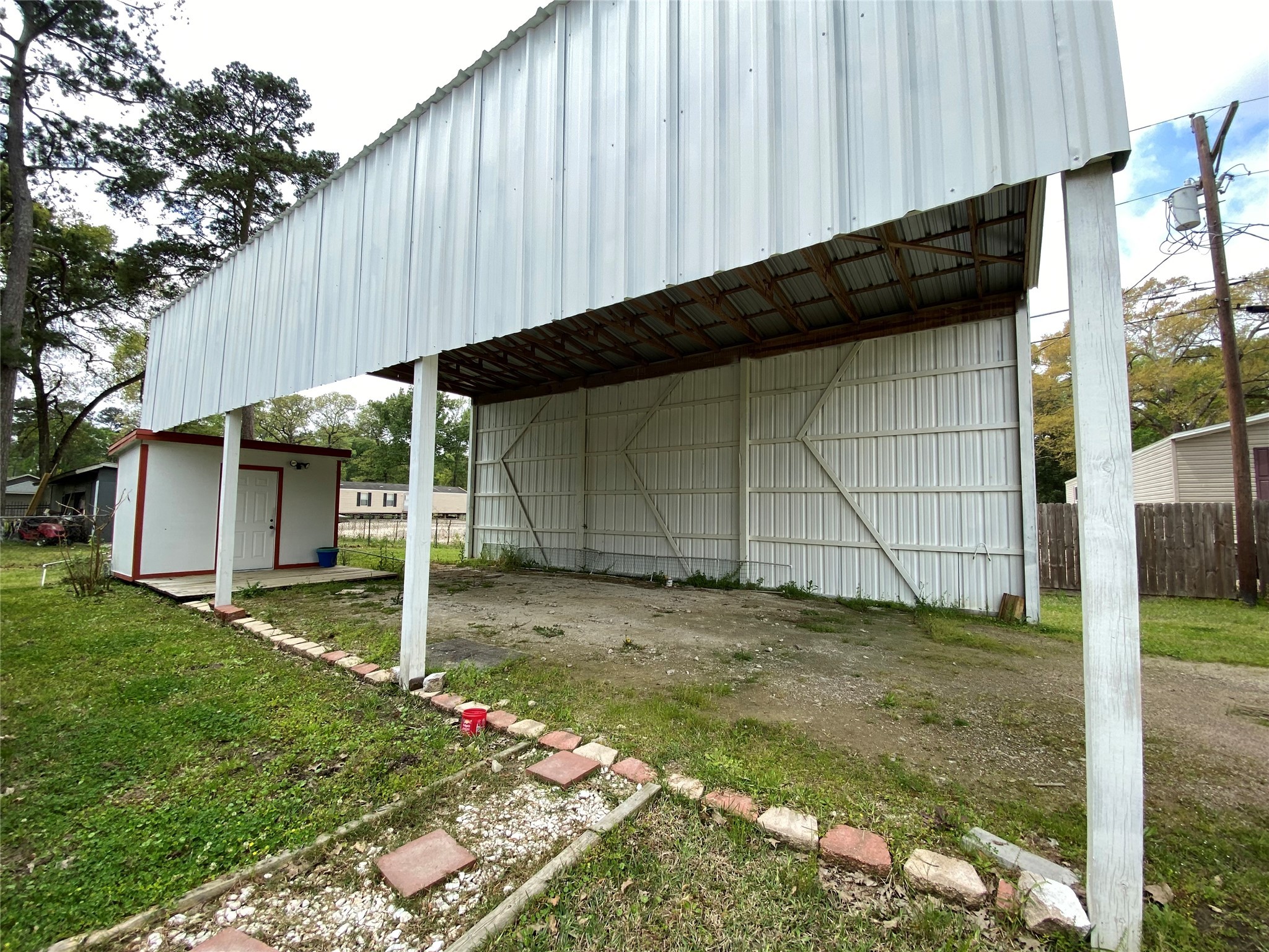 20672 Trinity Way New Caney, TX 77357 - Photo 34 of 41 a backyard of a house
