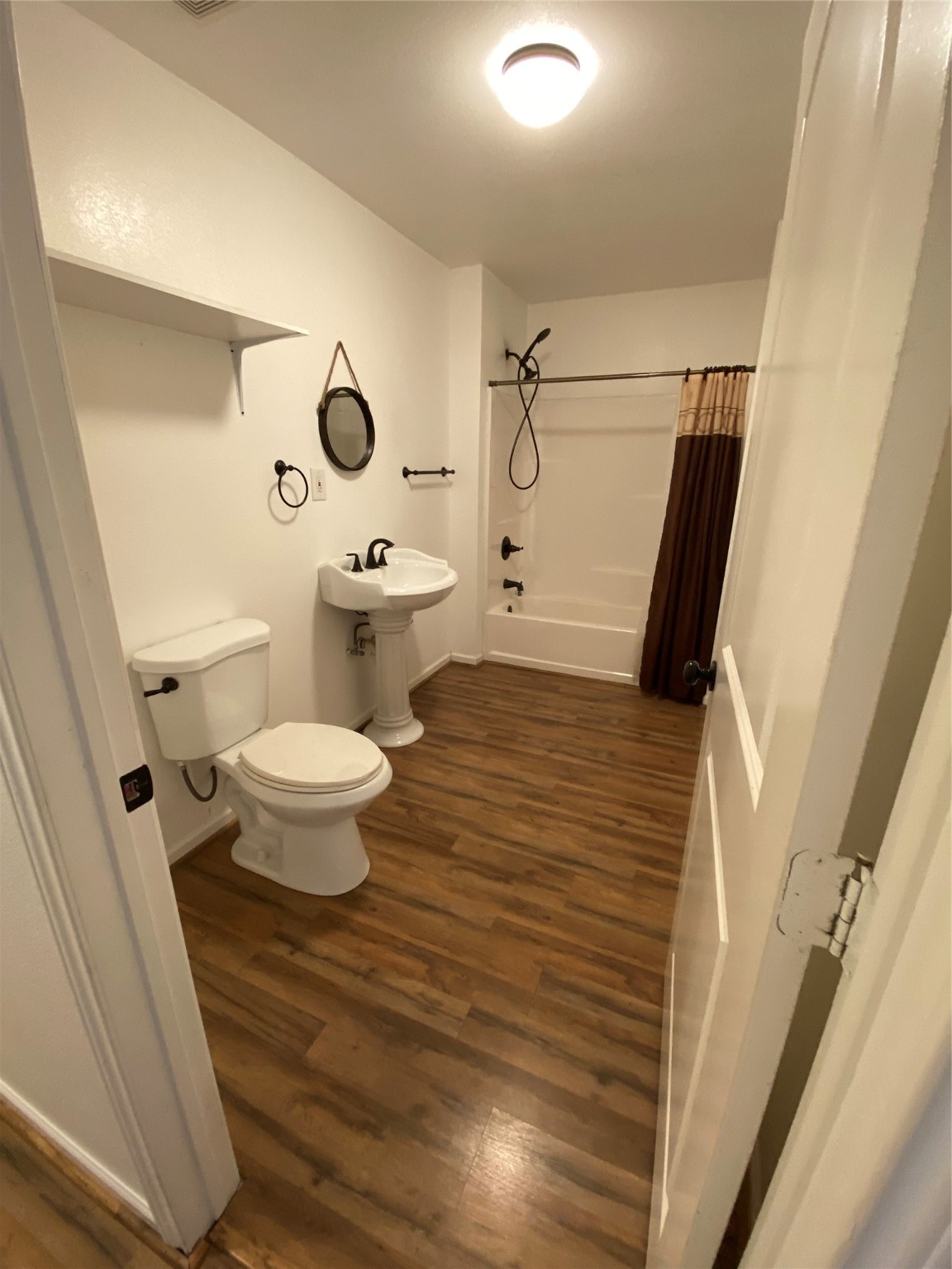 20672 Trinity Way New Caney, TX 77357 - Photo 8 of 41 a bathroom with a toilet and a shower