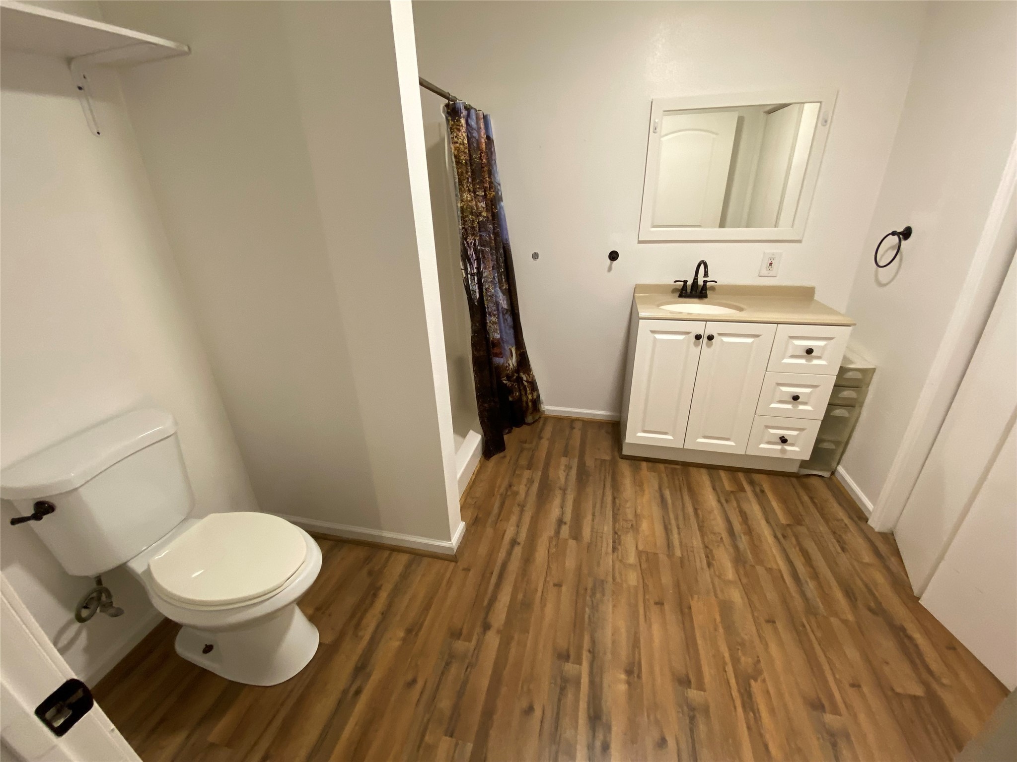 20672 Trinity Way New Caney, TX 77357 - Photo 10 of 41 a bathroom with a sink and a toilet