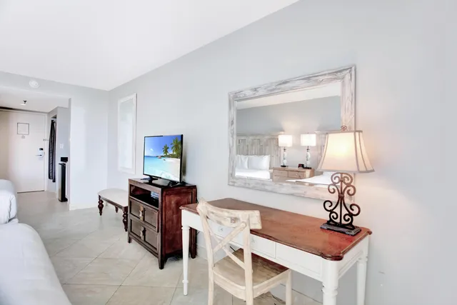 a kitchen with granite countertop a sink cabinets and window