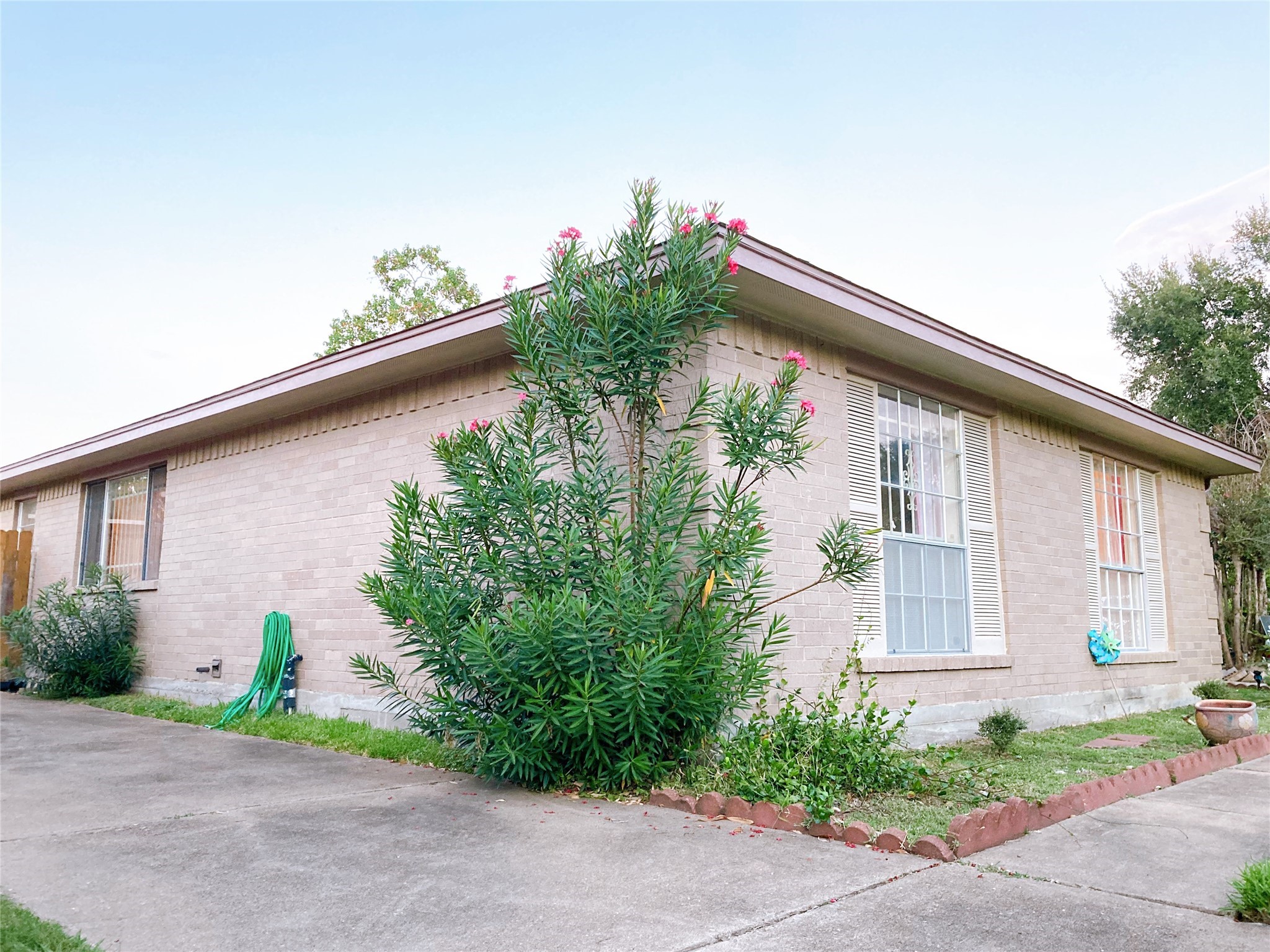 19518 Munsey Court Katy, TX 77449 - Photo 4 of 45 a front view of a house with a yard and garage