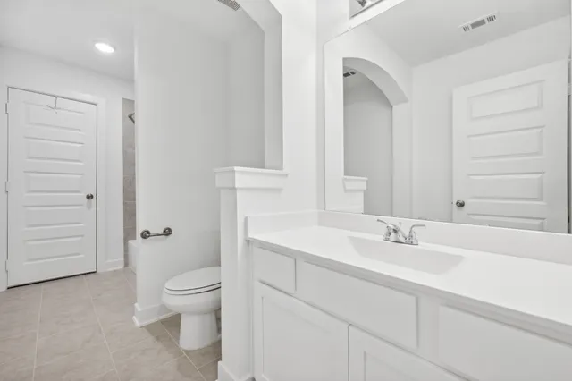 a bathroom with a tub and shower