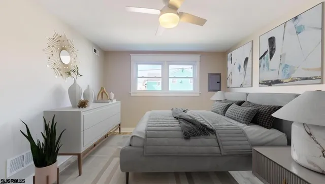 a living room with furniture flowerpot and window